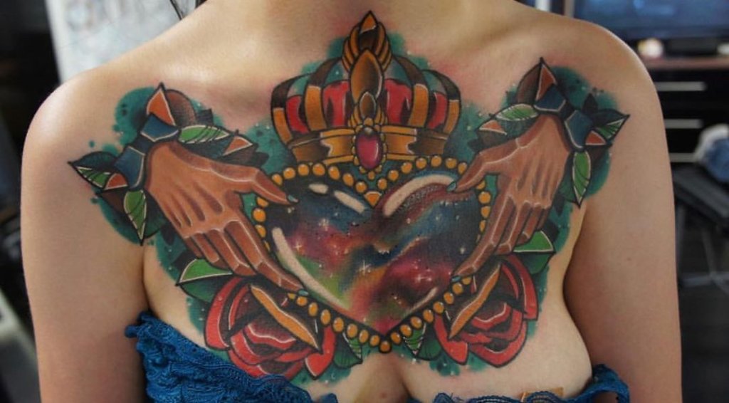 Feminine Chest Hands Holding Heart Tattoo Design