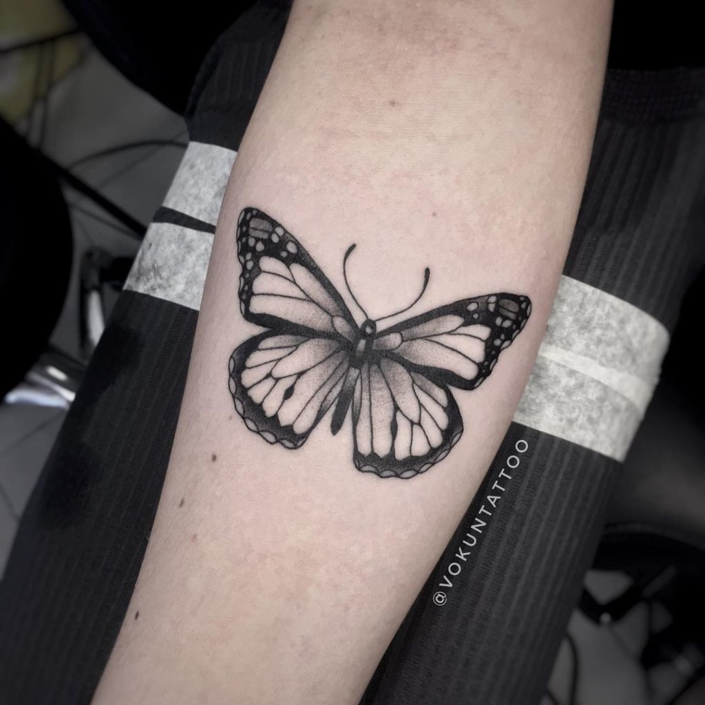 Small And Black Butterfly Tattoo Designs