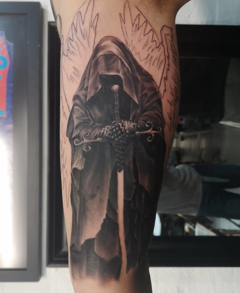 Unique And Scary Angel Tattoo On Arm