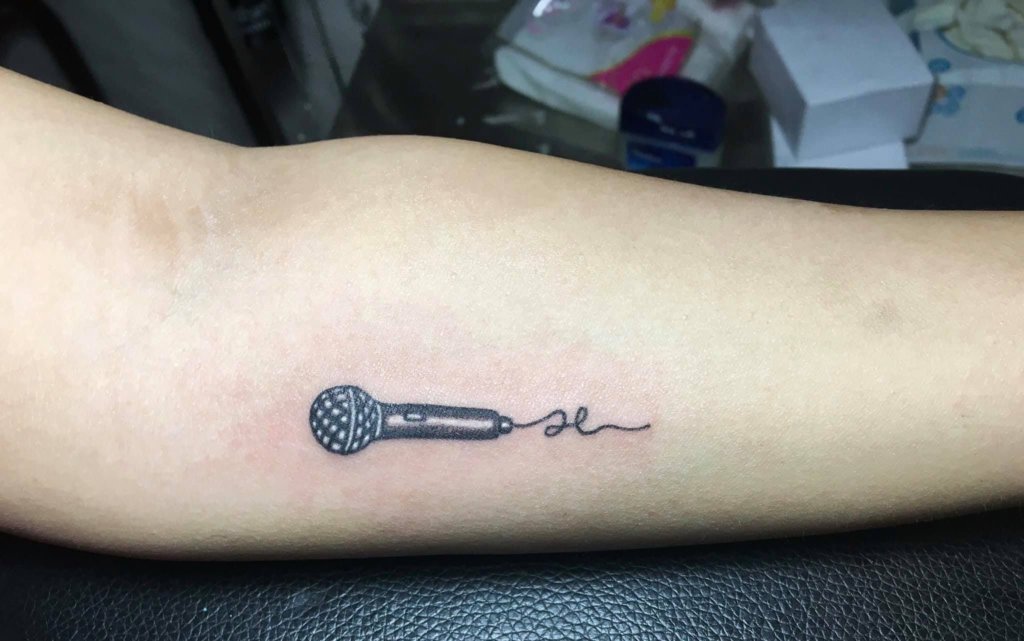 Small Mic and Music Notes Tattoo