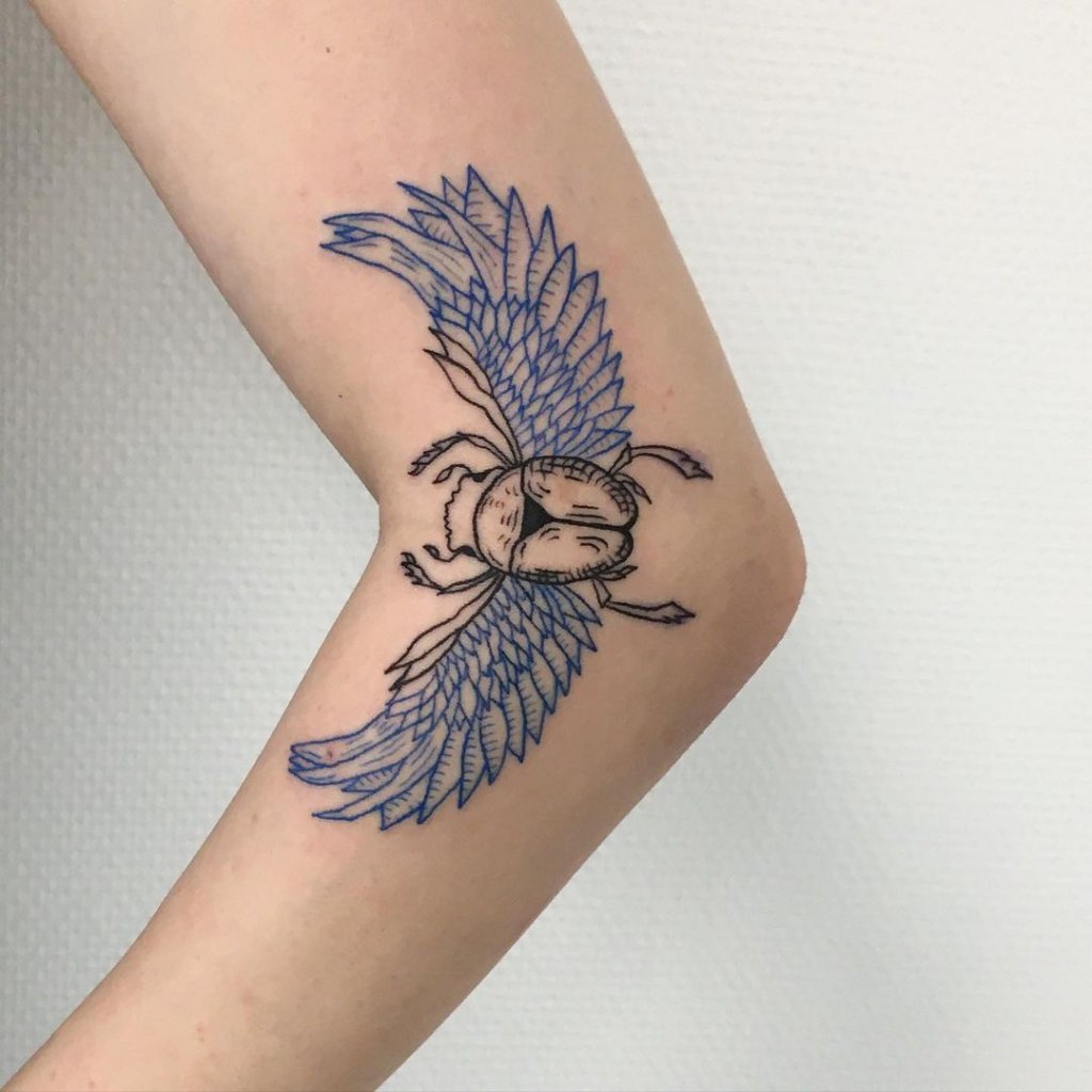 Bug Inspired Blue Tattoo