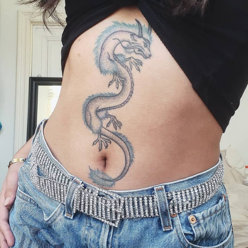 Dragon Black And Blue Tattoo Over Stomach