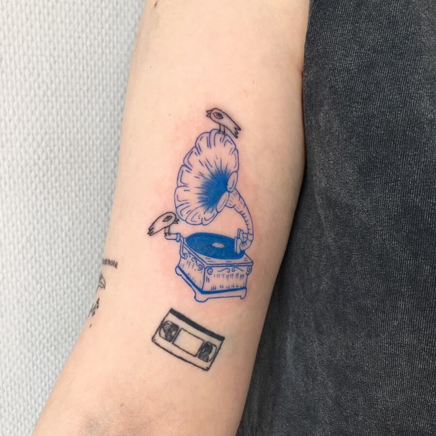 Forearm Black And Blue Tattoo Record Player
