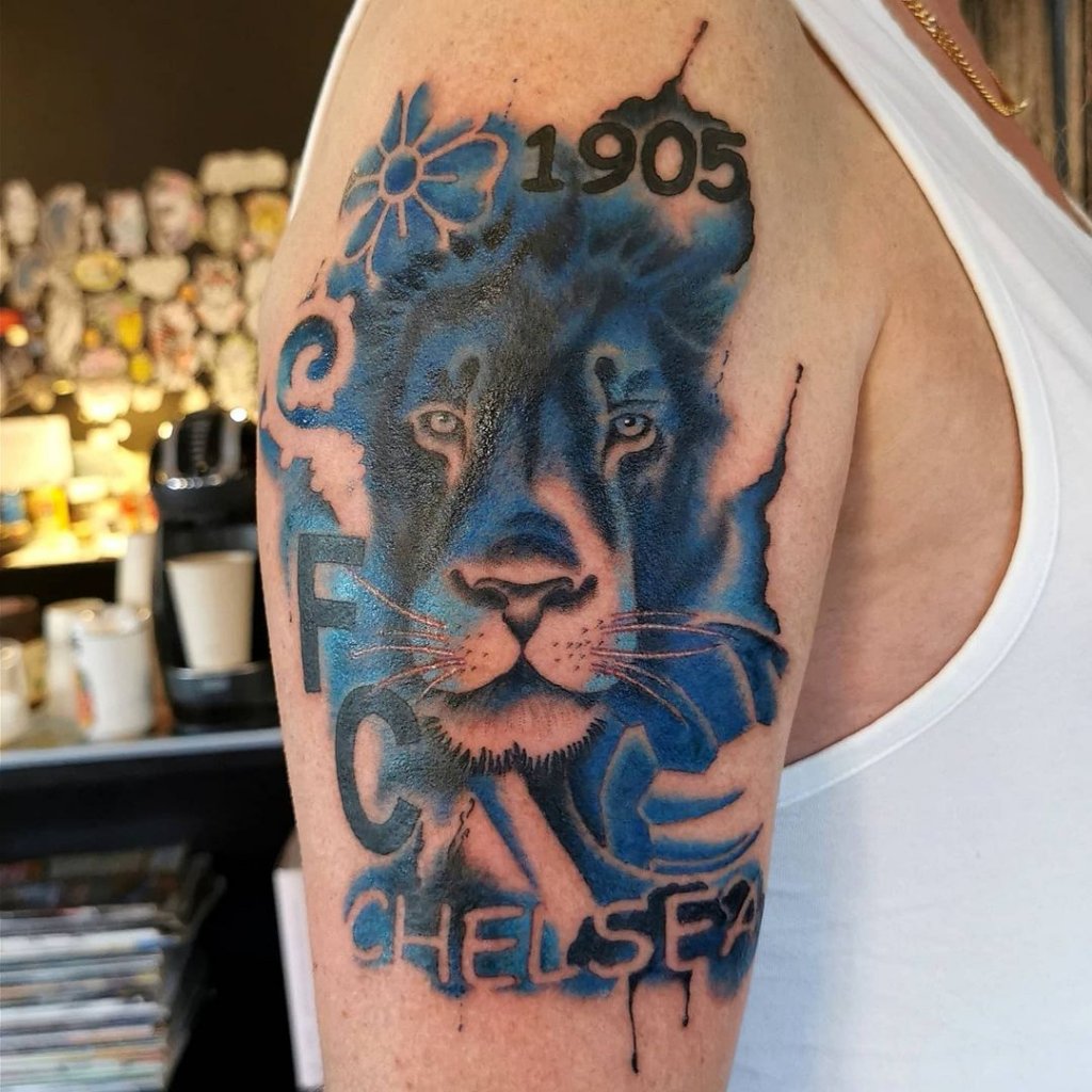Giant Bright Blue Lion Tattoo