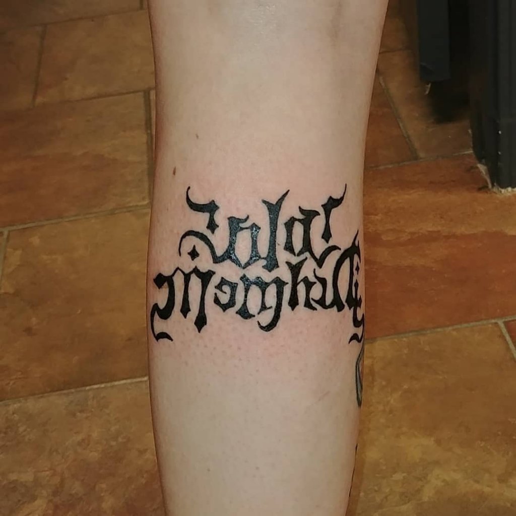Scary Black Valar Morghulis Coin Tattoo