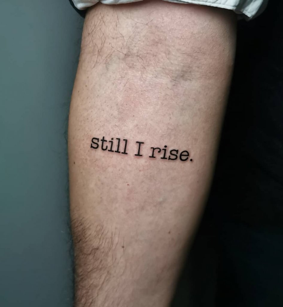 Small Black Ink Still I Rise Tattoo
