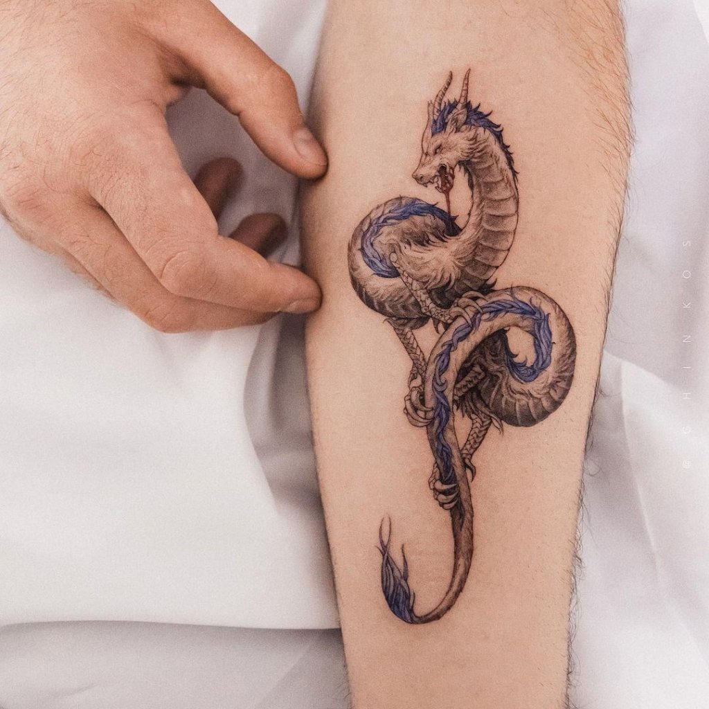 Small Bright Blue Dragon Tattoo Over Forearm