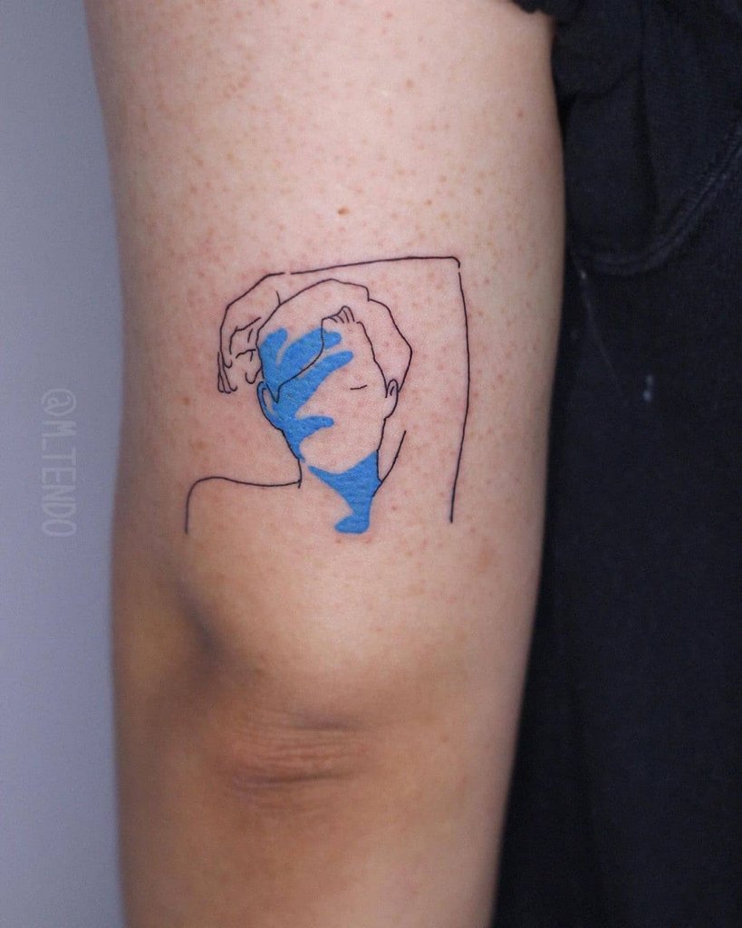 Small Bright Blue Tattoo Over Forearm