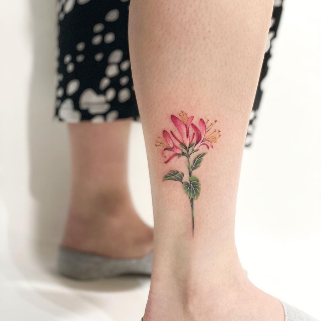 Small & Bright Honeysuckle Tattoo Designs Over Leg