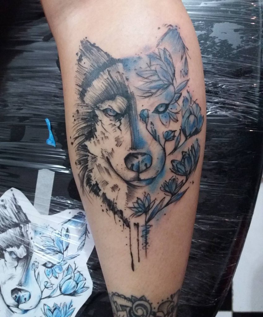 Wolf Inspired Black And Blue Tattoos