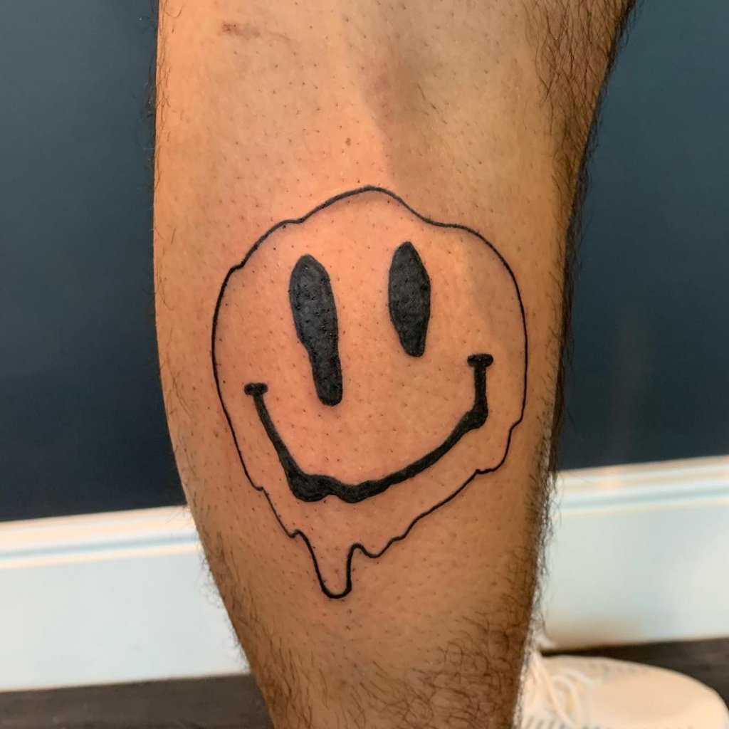 smiley face tattoo