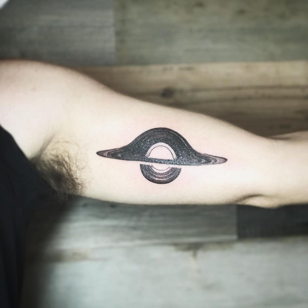 black hole tattoo