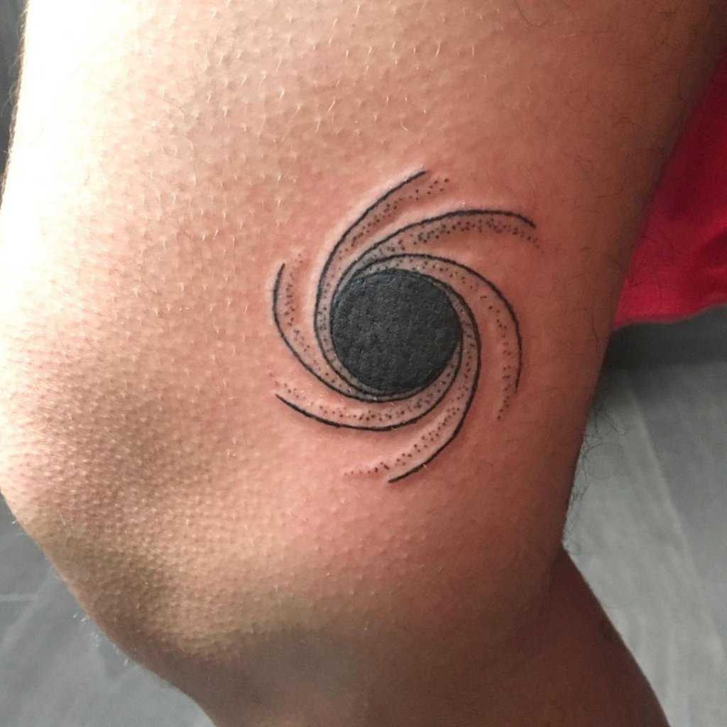 black hole tattoo