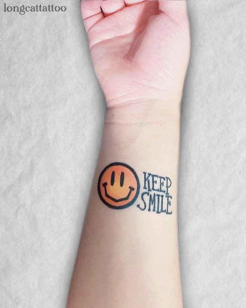 smiley face tattoo