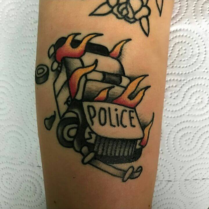 Police brutality can be a great antifa tattoo idea 