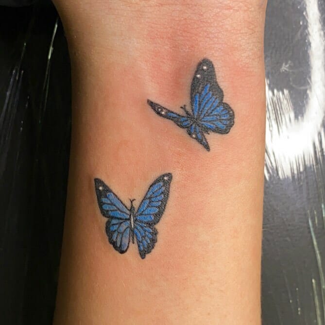 A Pair of Small Monarch Blue Butterfly Tattoos