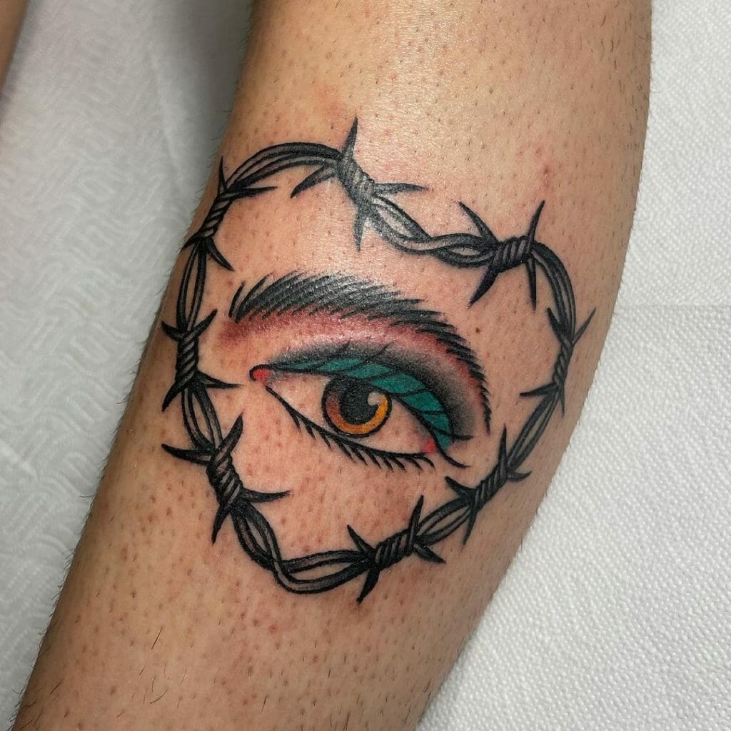 An Eye Inside A Barbed Wire Tattoo
