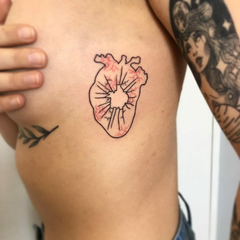 Artistic Bullet Hole Tattoo In The Heart