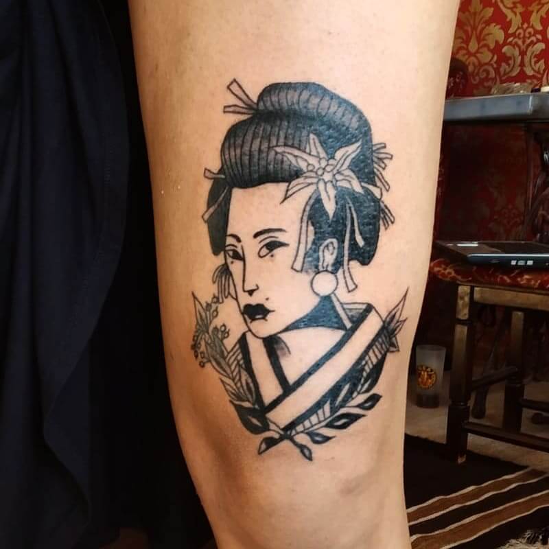 Asian Tattoo With A Woman's Face
