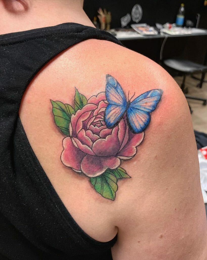 Blue Butterfly On Rose Tattoo