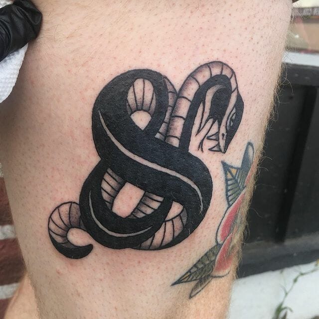 Bold Ampersand Tattoo With Snake Designs
