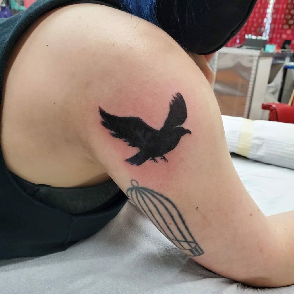 Bold Black Bird Tattoo