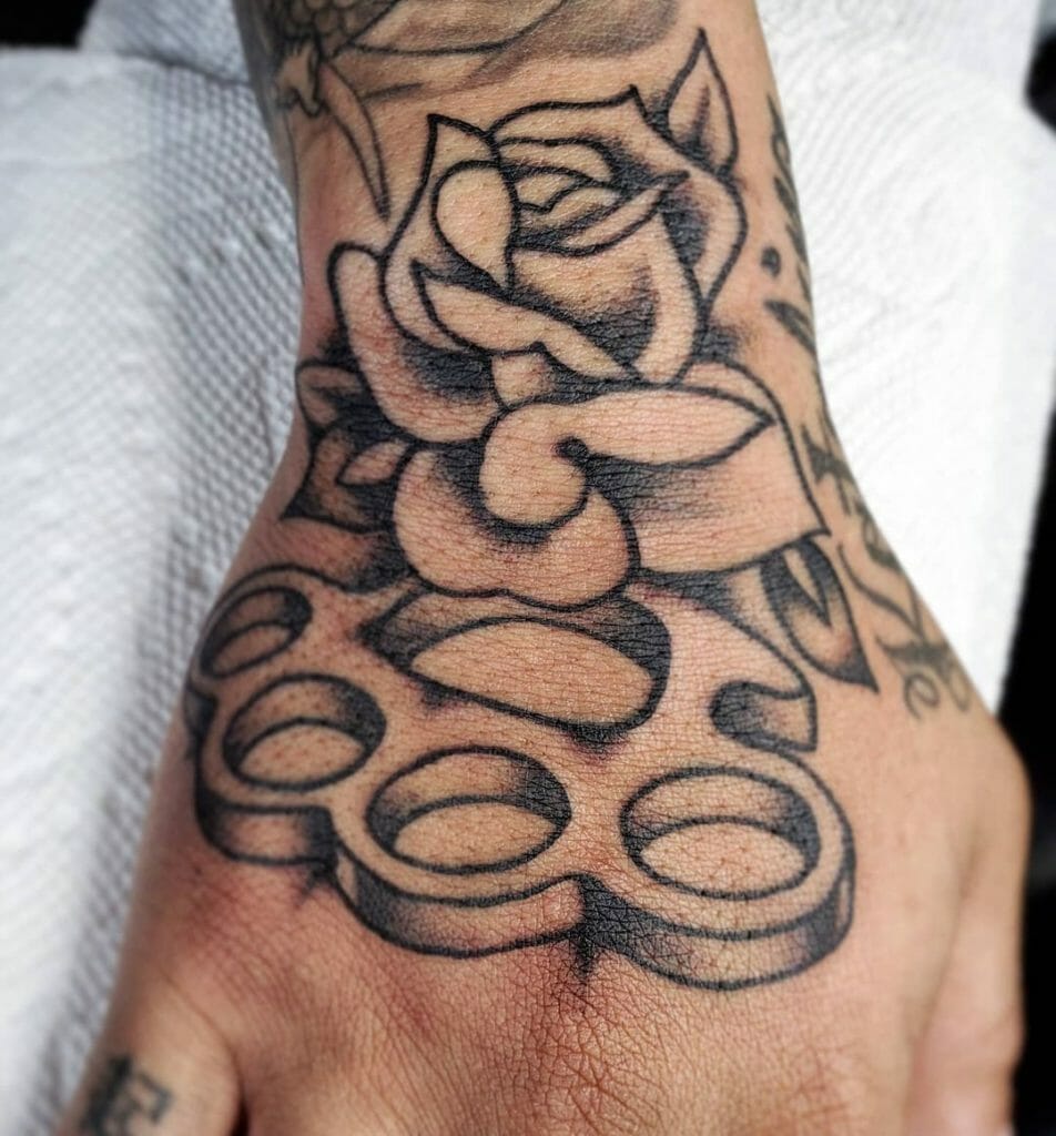 Brass Knuckle Tattoos With Floral Motif