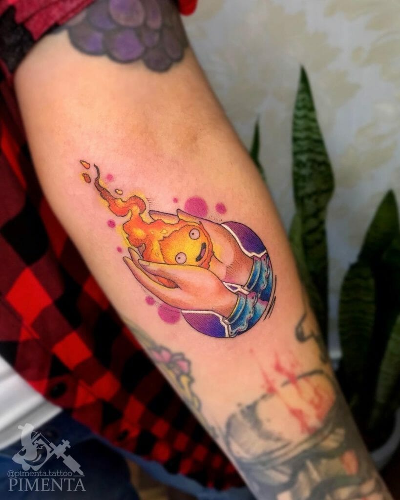Calcifer In Sophie's Hands Tattoo