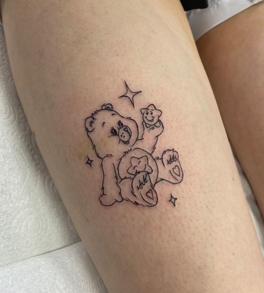 Care Bear And Star Tattoo On Arm