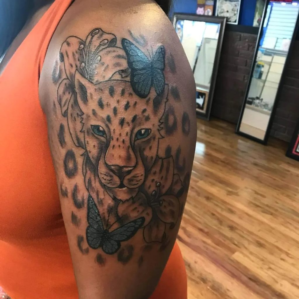 Cheetah And Blue Butterfly Tattoo