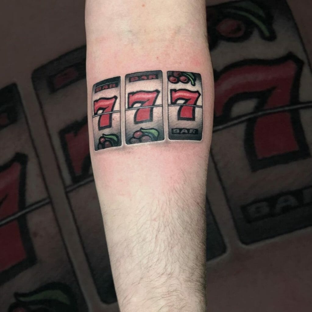 Tattoo of the number 777 located on the bicep
