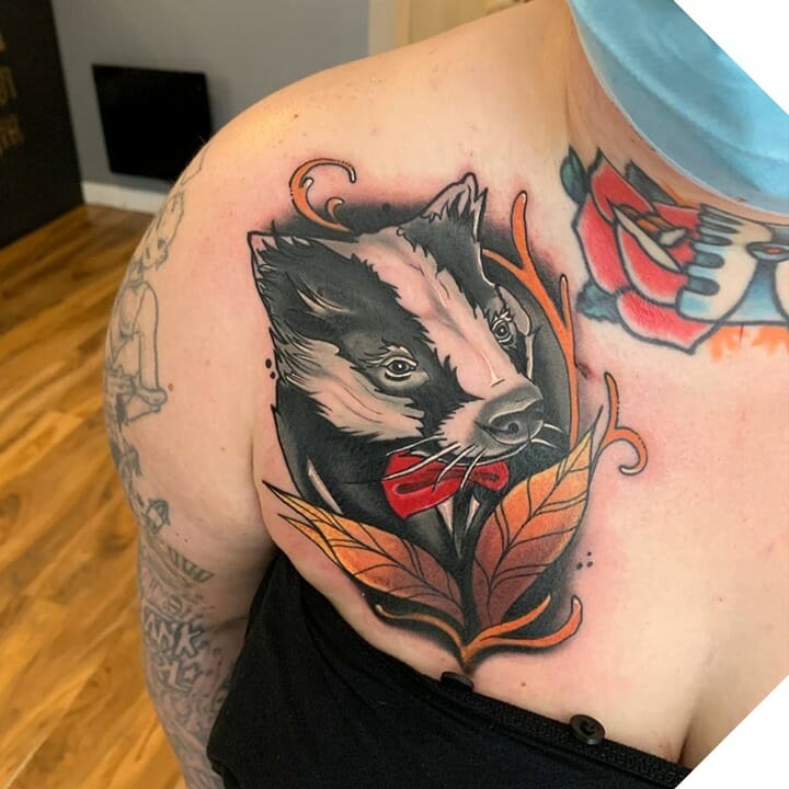 Cute Badger Tattoo With A Red Bow