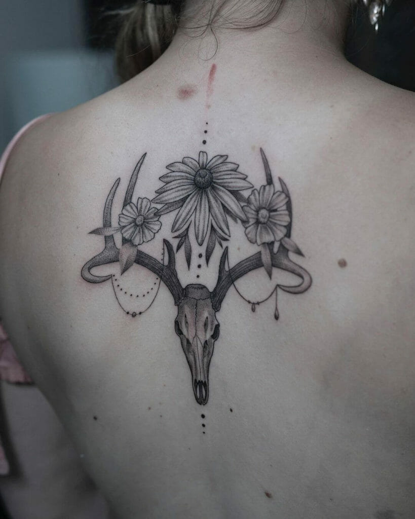 Deer Skull with Antlers and Flowers Tattoo