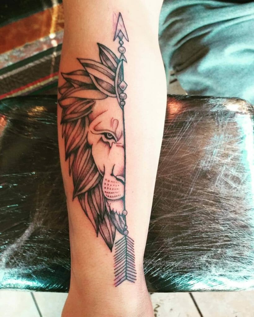 Fierce Lion And Arrow Tattoo