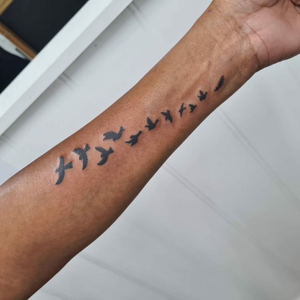 Flying Bird Silhouette Tattoos
