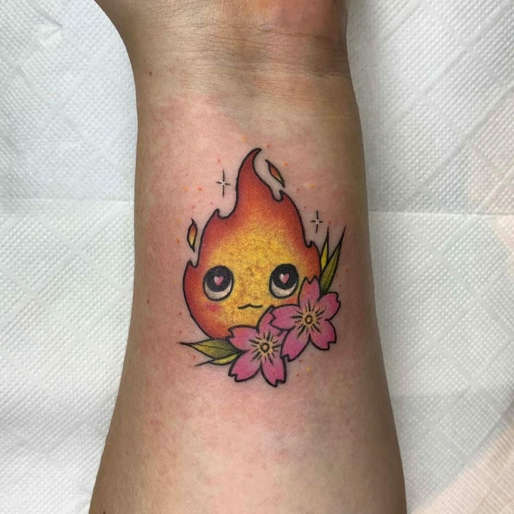 Howl's Moving Castle Calcifer Tattoo With A Floral Theme