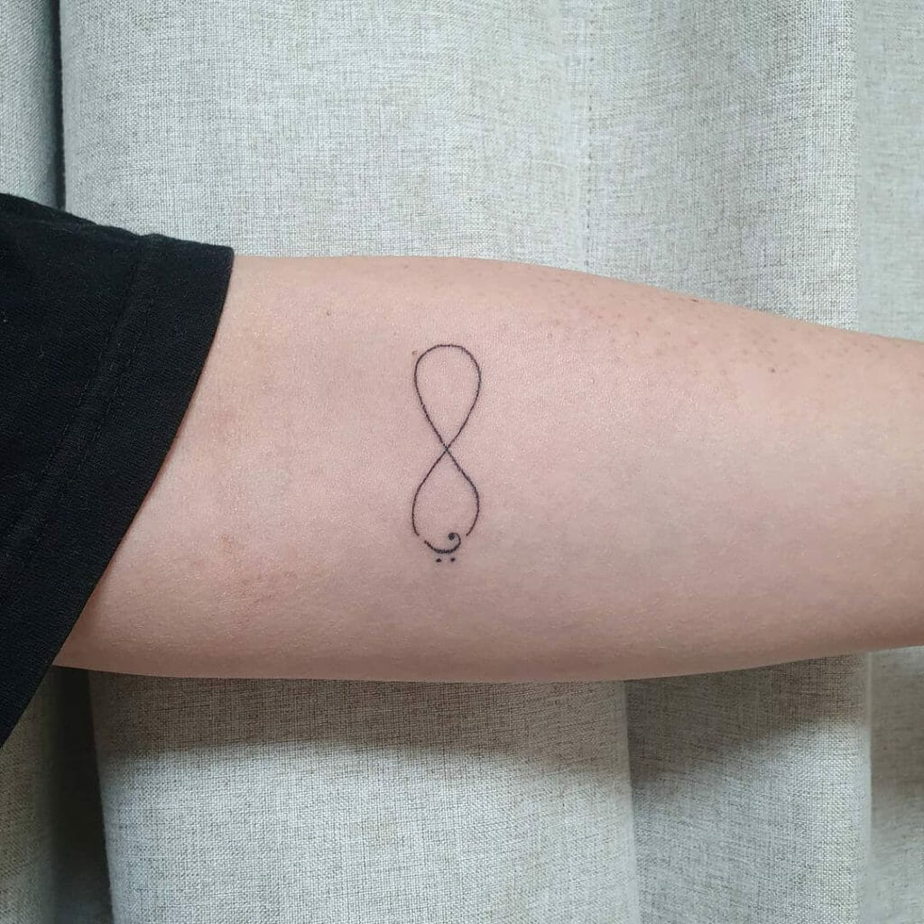 Infinity Loop And Bass Clef Tattoo