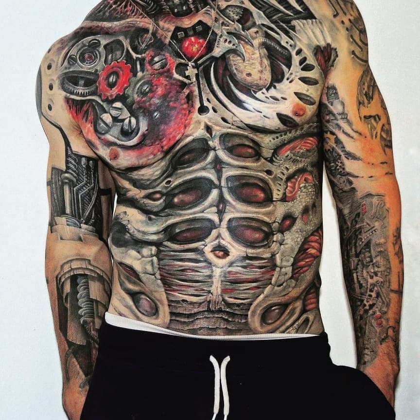 Intricate Biomech Tattoo