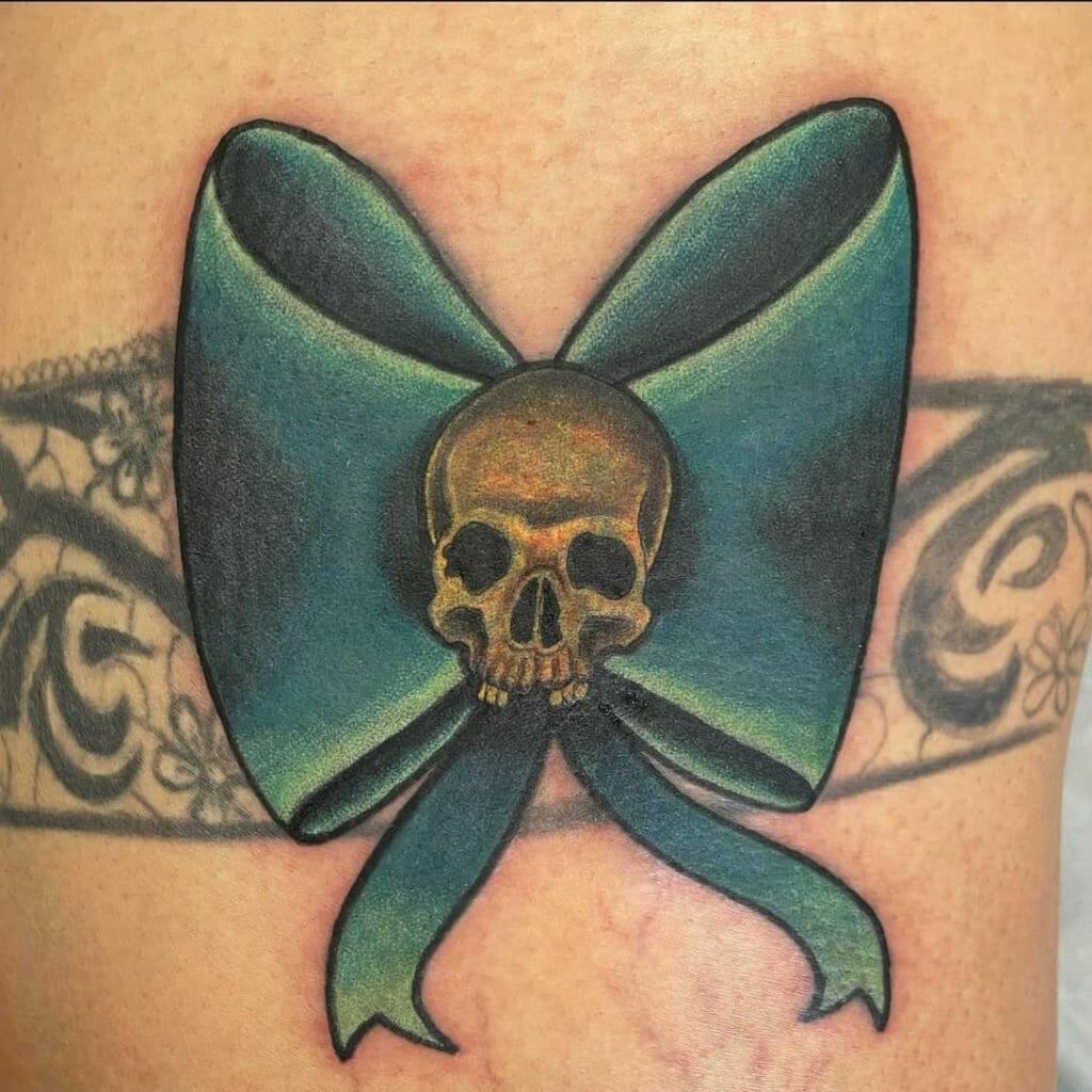 Intriguing Bow Tattoo With A Skull