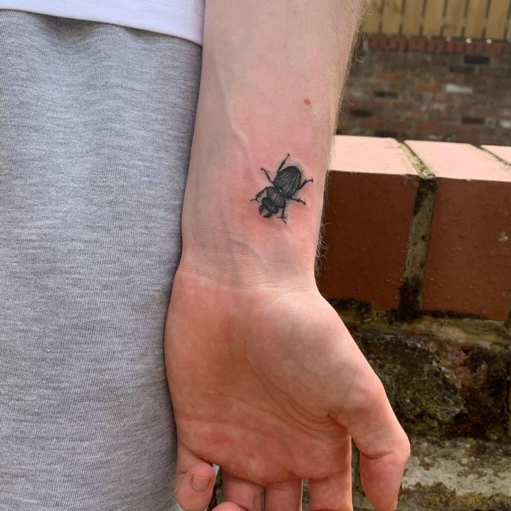 Minimalist Beetle Tattoo