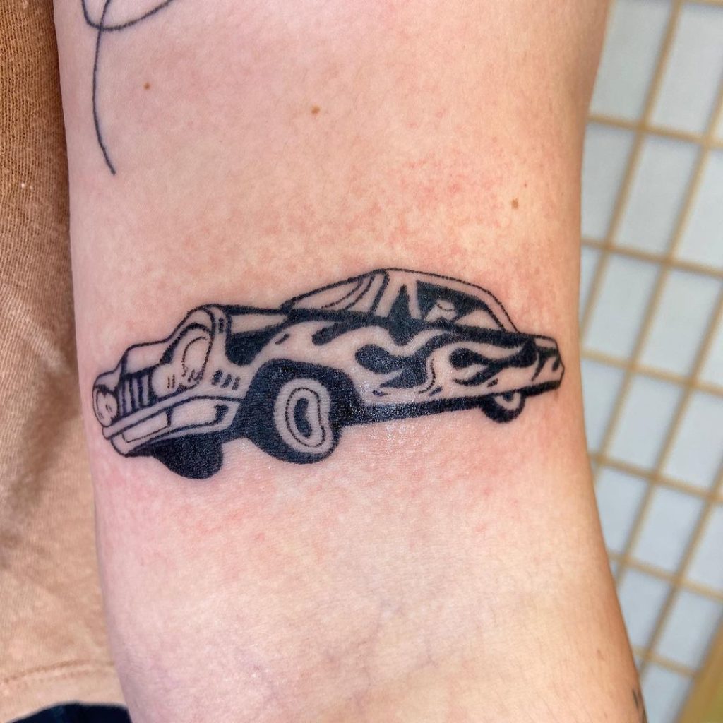Minimalistic Race Car Tattoo Design For People Who Love The Fast Lane