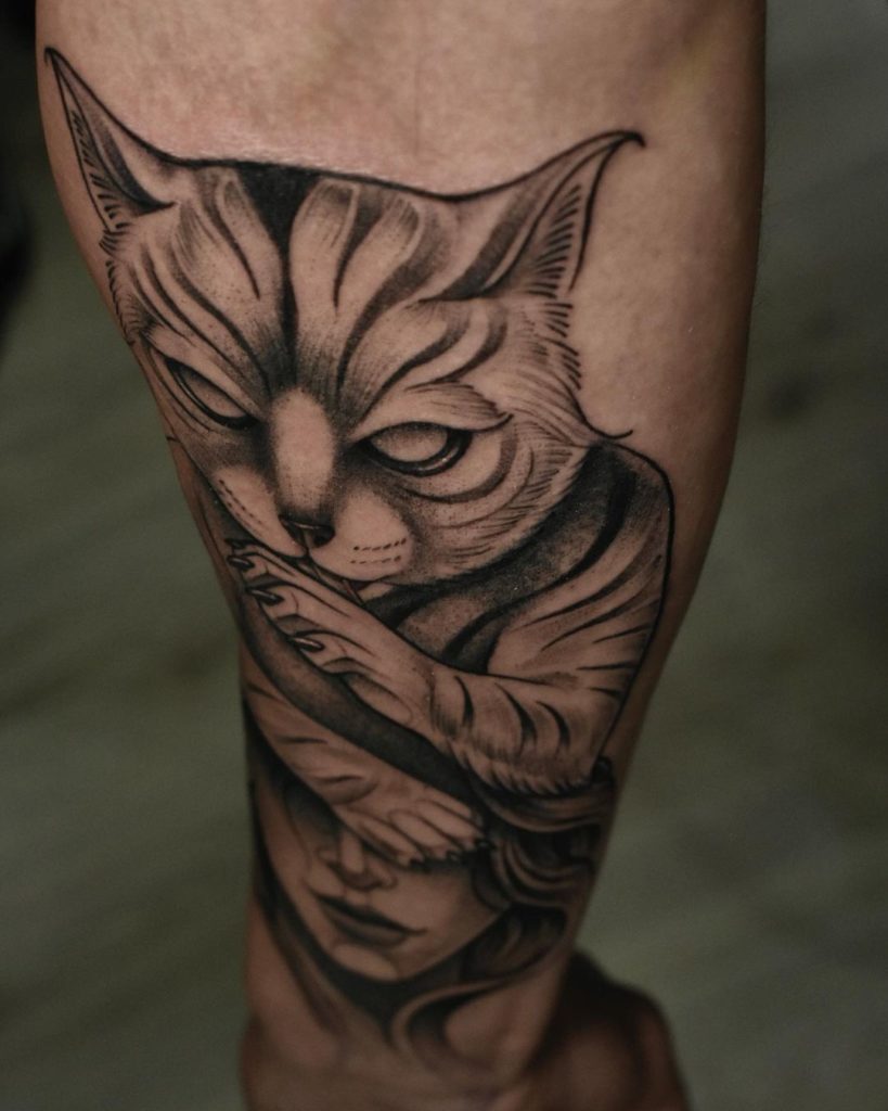 Nocturnal Cat Tattoo Covering The Lady's Eyes Tattoo
