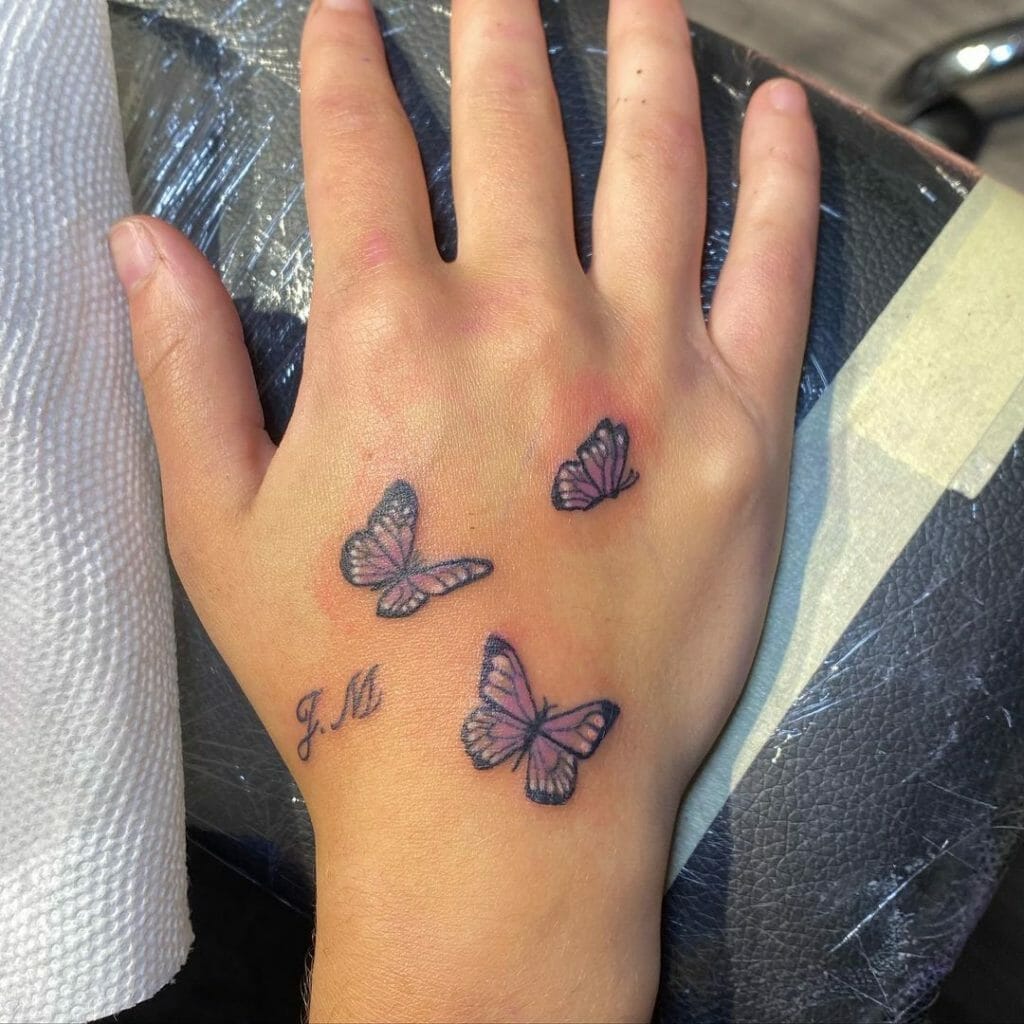 Set of Small Butterflies Hand Tattoo