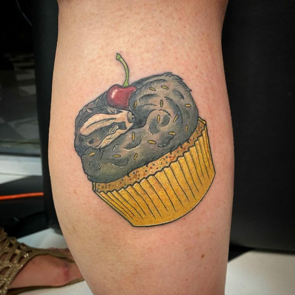 Sleepy Badger On A Cupcake Tattoo