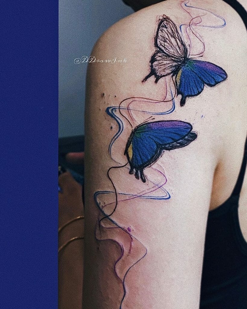 The Delicate Blue Butterfly Arm Tattoos