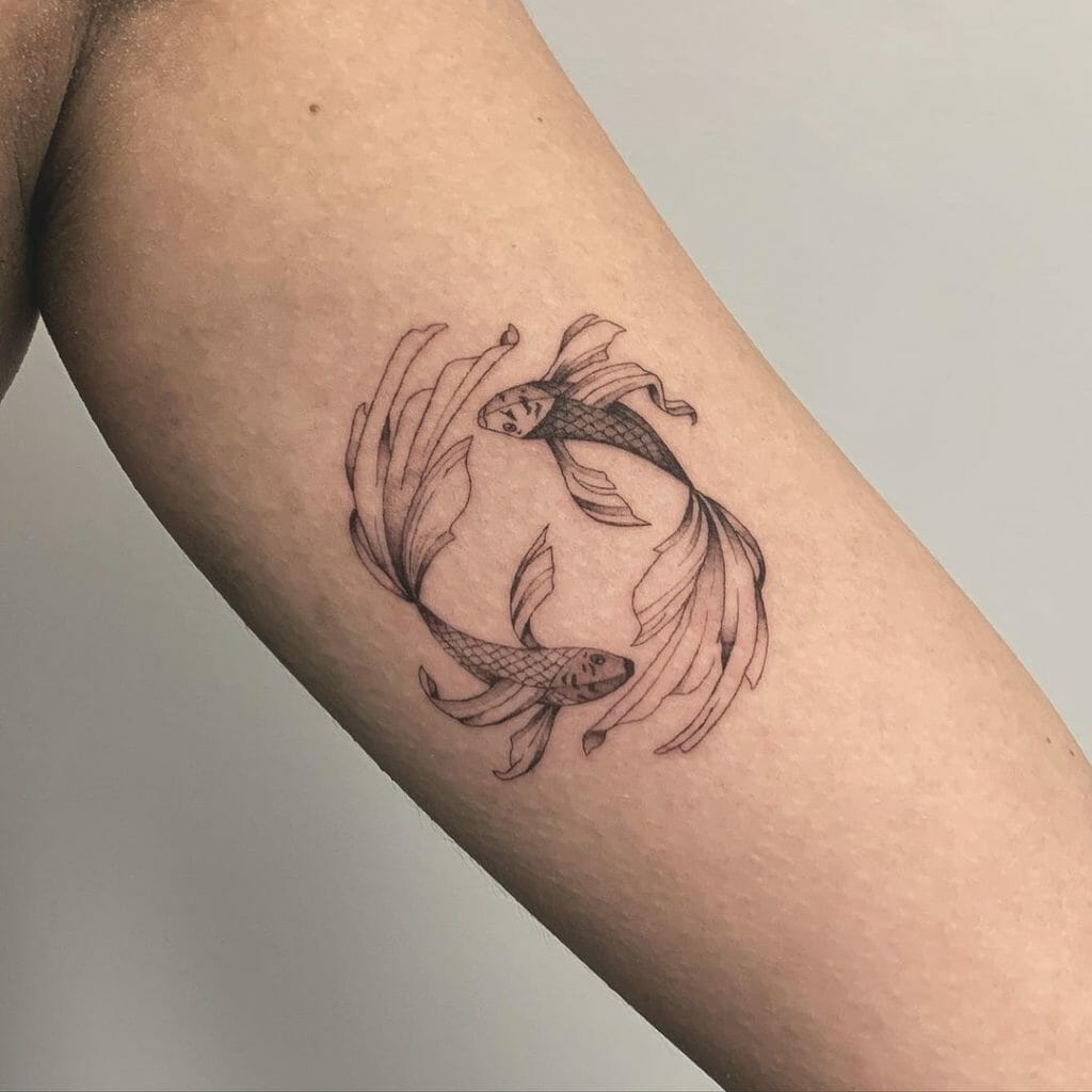 The Soulful Pisces Fish And Symbol Tattoo