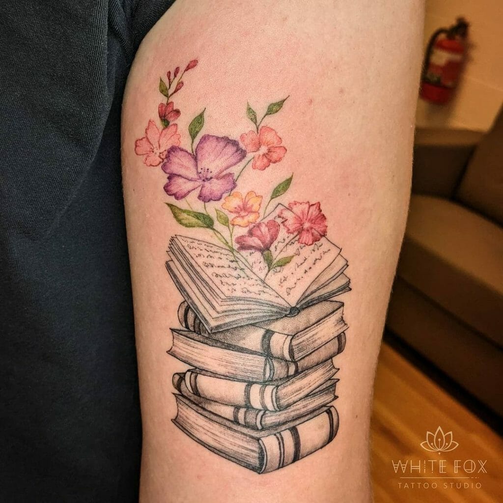 The Tattoo With A Stack Of Books