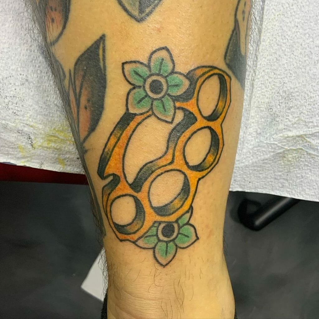 Vibrant And Colourful Brass Knuckle Tattoo Designs