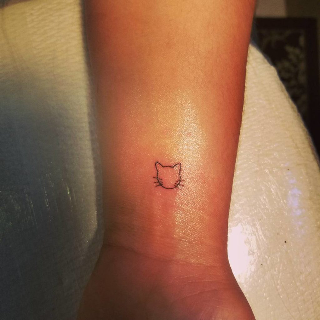 Wrist Cat Outline Tattoo