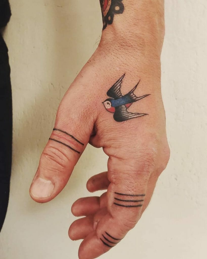 bird hand tattoo